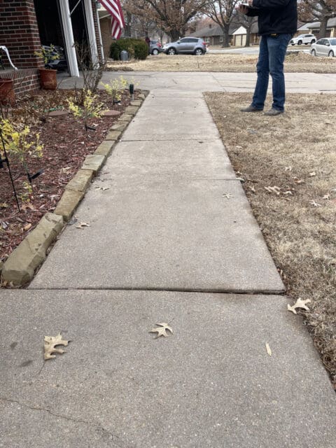 damaged concrete sidewalk