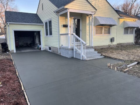 new concrete driveway and small sidewalk